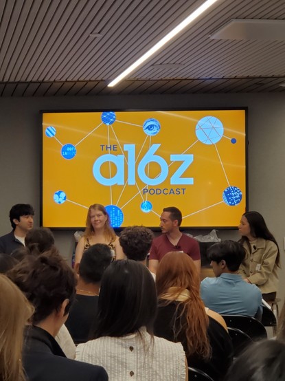 Panelists Gaurav Misra, Laura Burkhauser and Charles Reina with moderator at a16z podcast recording