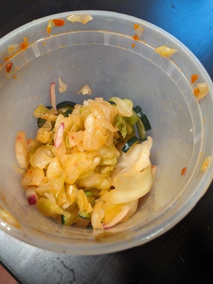 Despite dumping in half the packet of salty spicy stuff and sticking the mess in the fridge for 4 days, no rich red color or flavorful taste has developed, just a disgusting smell.