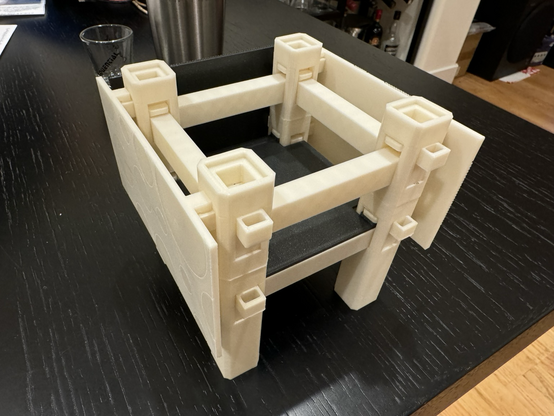 3D printed model of the furniture structure now with side and back veneers. 