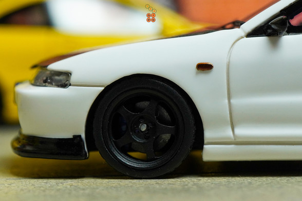 A close-up of Honda Integra Type R (DC2) Spoon Sports by Nice Auto in 1:64 scale with 1:64 figure on AREA 164