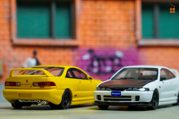 Honda Integra Type R (DC2) Spoon Sports yellow and white by Nice Auto in 1:64 scale with 1:64 figure on AREA 164