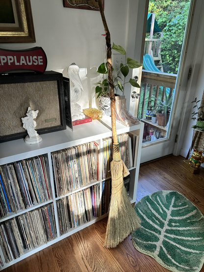 Sunrise on a broom and record shelf 