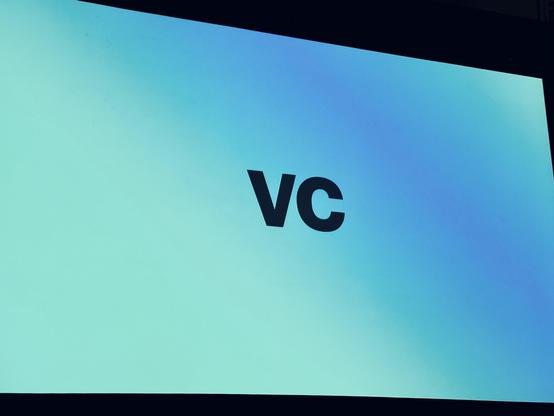 Picture of a slide with the word VC which stands for video conference 