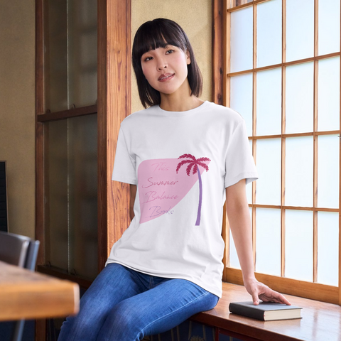 Pink palm tree graphic with text "This Summer: Balance Books & Beaches" on a t-shirt mockup. Free vector download available.