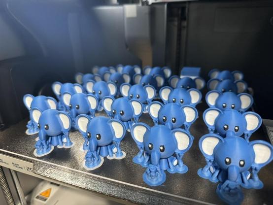 23 3D printed elephant figures.