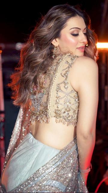 Hansika Motwani takes the fashion world by storm in an exquisite designer saree valued at two lakhs. This luxurious piece highlights the latest trends and showcases Hansika's fashion-forward style. Be inspired by her elegant look and discover the magic of high-end fashion. Perfect for those who admire celebrity fashion and love to stay updated with the latest trends!