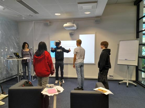 Participants represent a data visualization with their bodies