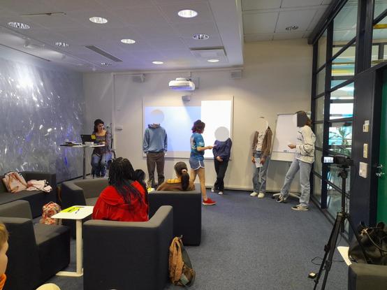 Participants performing a data forum about data biases in assessment software