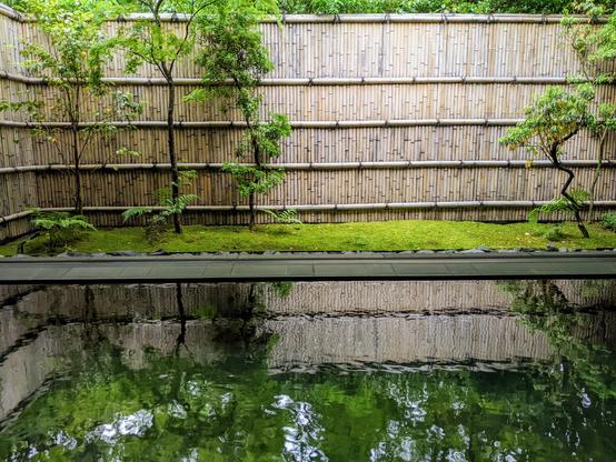 The outdoor bath at Aman's spa, surrounded by a moss garden.