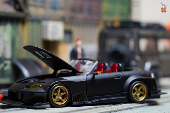 A left side of Honda S2000 Race Car, Voltex Time Attack by Micro Turbo in 1:64 scale with 1:64 figure on AREA 164