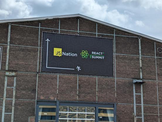 A big advertisement of the conference hanged on the front of the building.