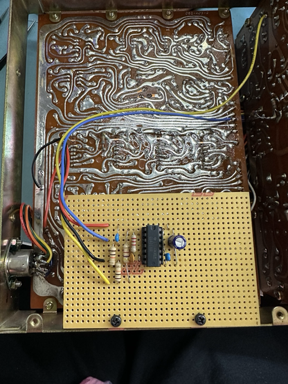 Picture of a PCB with a chip on inside a synth module from the 1980s
