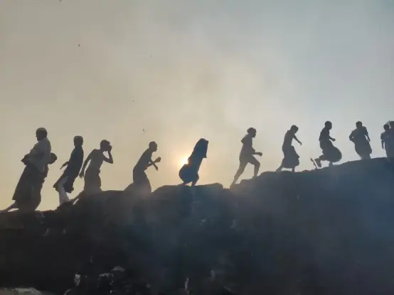 Fire rages in Camp 11 of Kutupalong Balukhali refugee camp in Cox’s Bazar, Bangladesh, on March 5, 2023. The blaze destroyed more than 3,000 shelters, leaving some 16,000 of the camp’s 32,000 Rohingya refugee population homeless, while some 200 people were treated for injuries. More than 155 facilities, including hospitals and learning centres, were also destroyed. Some 980 WASH facilities, including latrines, bathing facilities and the water network, were also damaged. [Sahat Zia Hero/UNHCR]