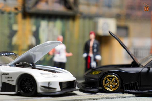 Honda S2000 J’S RACING Metallic White and Race Car, Voltex Time Attack Matte Black by Micro Turbo in 1:64 scale with 1:64 figure on AREA 164