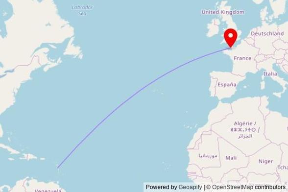A map showing the great circle route from Roseau in Dominica to a map pin at St. Clement's Church, Grande Route de St. Clement, St. Clement, Jersey, Channel Islands