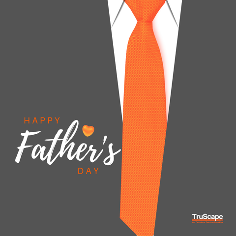 Graphic of an orange tie on a white shirt with the message 'Happy Father's Day' in white and orange text, and the TruScape logo at the bottom right corner.