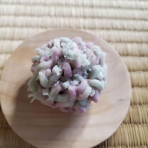 Hydrangea inspired kinton.
Kinton are a traditional sweet. A dough is made from a type of yam, coloured and then shredded. This shredding is then added to a core of bean paste, giving the sweet a round, fuzzy look.