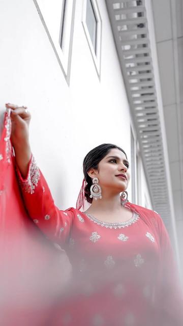 Swaswika’s Eid celebration in a traditional red outfit is a fashion masterpiece. The rich red color, combined with detailed embroidery, highlights her impeccable taste in fashion. This ensemble perfectly captures the essence of traditional elegance with a modern twist. Celebrate Eid with Swaswika's stunning style and make a bold fashion statement this festive season.