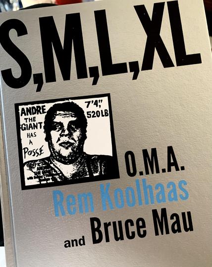 A copy of the famous Koolhaas/Mau book S,M,L,XL with a sticker of Andre the giant on the cover. 