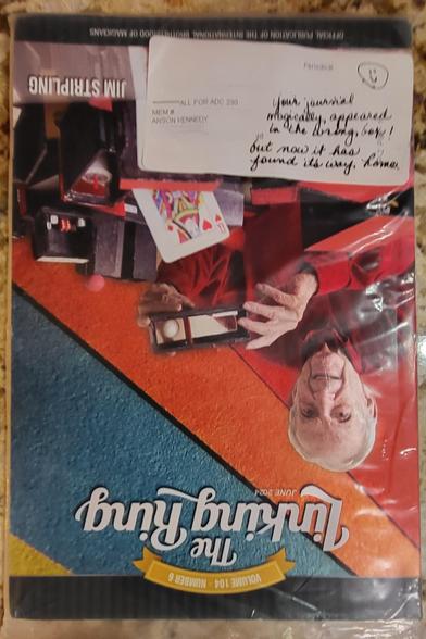Photo of cover of the June 2024 issue of The Linking Ring. Written on the mailing label (with a smiley face) is "Your journal magically appeared in the wrong box! But now it has found its way home."