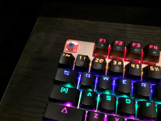 A photo of someone's RBG keyboard- the escape key is missing