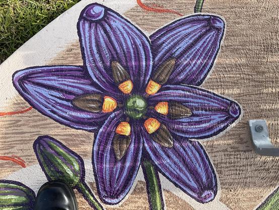 Detail of Dianella purple flower in mural 