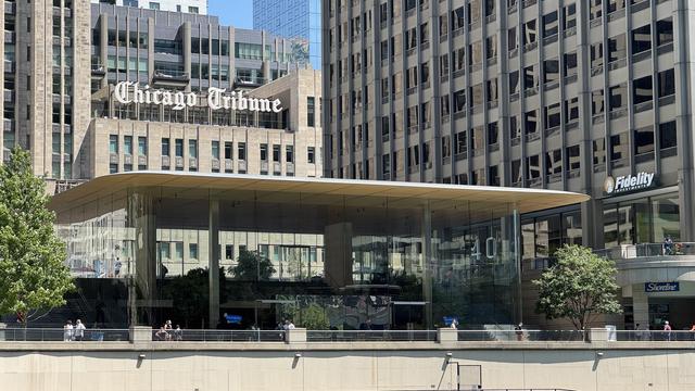 Apple Michigan Ave as seen from the river walk. Chicago Tribune sign in the background. 