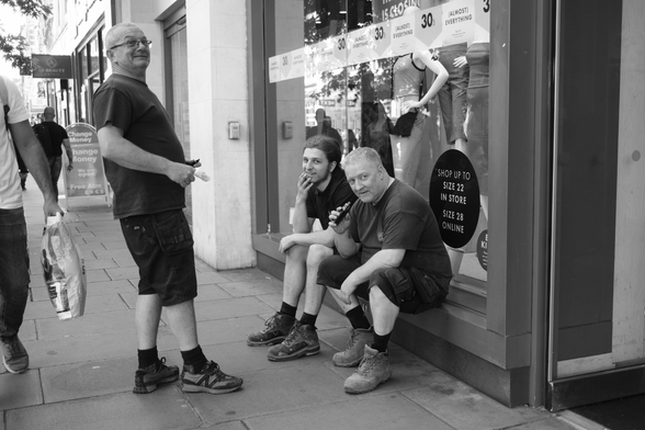 Workers taking a break in the street