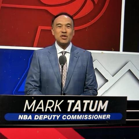Photo of Mark Tatum, the NBA Deputy Commissioner, announcing 2nd-round selections in the 2024 NBA Draft