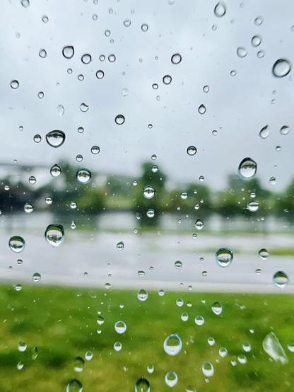 Macro of the rain in the pool window