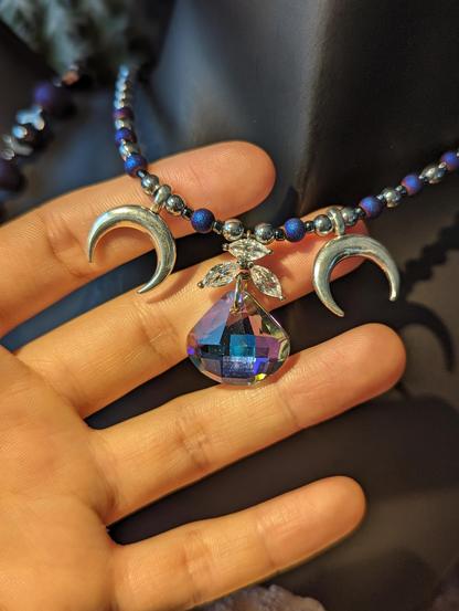 Handmade necklace with lilac soft glass pendant, silver crescent moon pendants and zircon leaf pendants, purple and silver beads