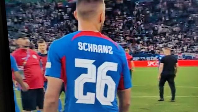 A after match photo of the Euro 2024 quarterfinals between England and Slovakia. You see the back of Slovakian player number 26. His name is "Schranz"... just as the name of a certain Techno style, that Chris Liebig had established in the early 2000s.