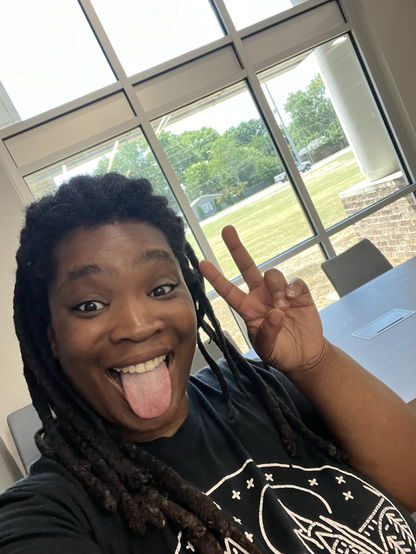 Content creator giving the peace sign after I recorded a podcast episode 