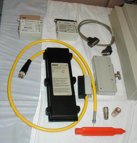 10BASE-5 Ethernet Transceivers. cables, and orange cable tapping tool