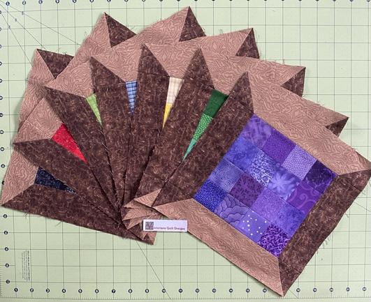 Seven Patchwork Spool Blocks. 