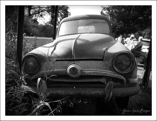 
Old rusty pickup car in a field...