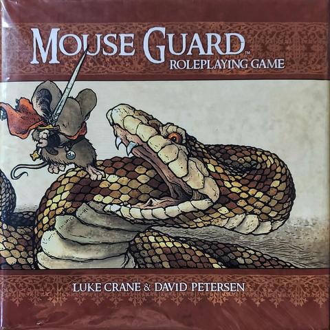 My photo of a Mouse Guard™ Roleplaying Game book, by Luke Crane & David Petersen.

An open mouthed viper is attacked by a caped, sword-wielding mouse warrior who is barely a mouthful for the snake.

The front of this books dust jacket is illustrated with wide top & bottom borders of brown with tan filigree.