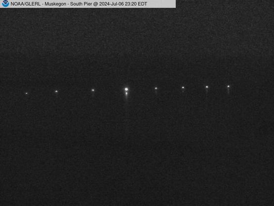 Wide view of the Muskegon channel southern breakwater stretching into Lake Michigan. // Image captured at: 2024-07-07 03:20:01 UTC (about 13 min. prior to this post) // Current Temp in Muskegon: 61.53 F | 16.41 C // Precip: few clouds // Wind: SSW at 3.444 mph | 5.54 kph // Humidity: 80%
