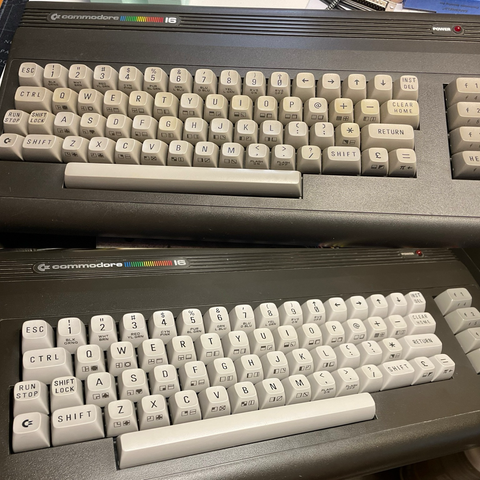 Two pictures of a Commodore 16 keyboard, before and after bleaching the keys, the top half shows the brownish keys, the lower one the nice evenly light gray keys.