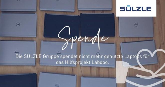 Auf eine hellen Holzboden liegen 16 unterschiedliche Dell-Laptops als IT-Spenden für Labdoo.