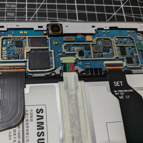 PCB of the Samsung SM-T800 tablet showing the CPU, GPU, without the metal shields.
