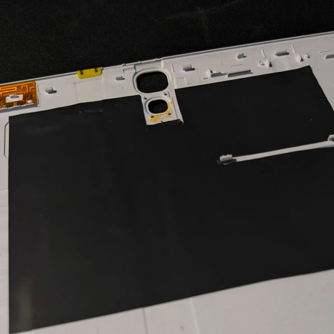 After-market back panel of the Samsung Galaxy Tab S 10.5 in white color with heat sink.