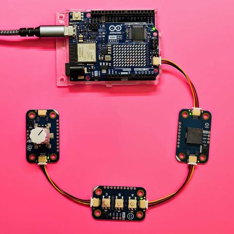 an Arduino UNO R4 board with three Modulino nodes connected via I2C