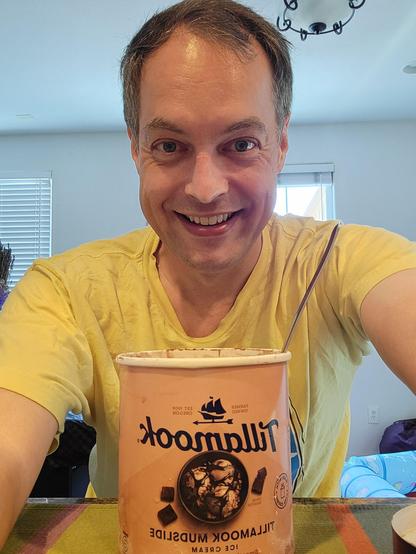 Selfie with carton of Tillamook Chocolate Mudslide ice cream
