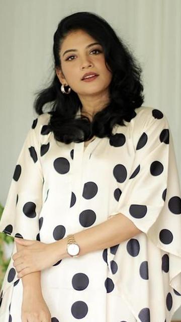 Shivada's black and white polka dot outfit is a must-have for anyone looking to elevate their casual style. This ensemble perfectly balances simplicity and sophistication, making it ideal for various occasions. The classic polka dots add a fun, playful element, while the black and white color scheme keeps it elegant and timeless. Whether you're running errands or having a casual lunch, Shivada's style is sure to make you stand out. Add some polka dot magic to your wardrobe and enjoy the perfect blend of casual and chic!