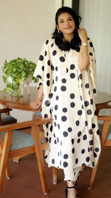 Looking for a stylish yet comfortable outfit for your next casual outing? Look no further than Shivada's stunning black and white polka dot ensemble! This look is the perfect blend of elegance and ease, featuring timeless polka dots that add a touch of fun to any occasion. Shivada shows us how to effortlessly pull off this classic trend, making it a versatile addition to any wardrobe. Embrace the polka dot style and get inspired by Shivada's chic fashion sense for your next casual day out!