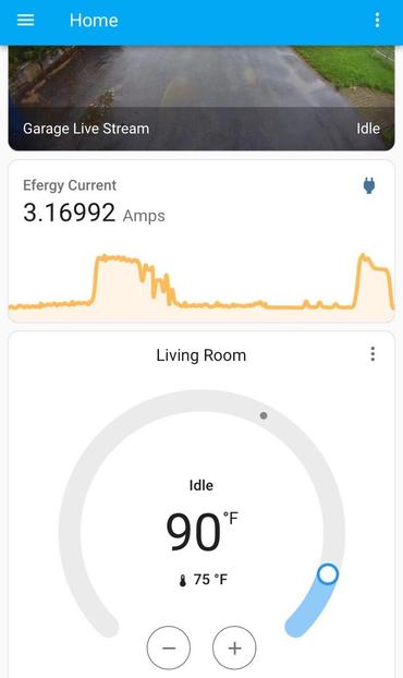 A home monitoring app showing a Ring camera garage live stream labeled 