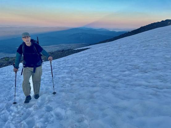 My dad on a glacier at sunrise. 
