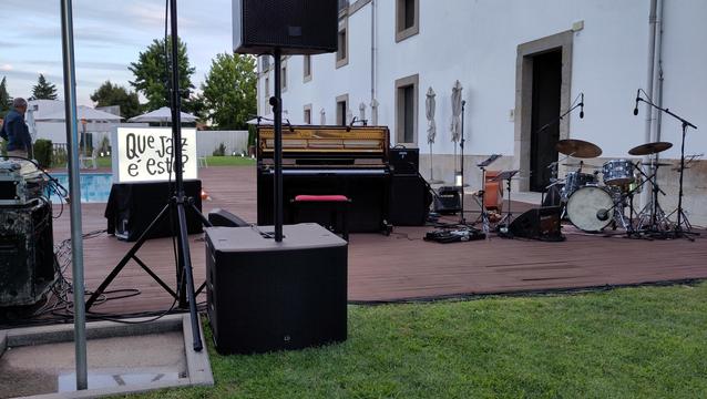 A small stage has been set up at the garden of an old hospital now hotel. There is a piano, a bass and a drum kit on stage. Not sure yet, what instrument the forth member of the quartet might play. We'll figure it out soon. ;)