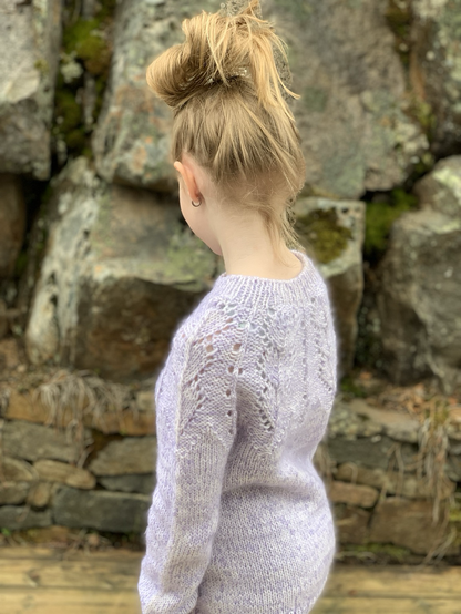 Girl in knitted sweater 
